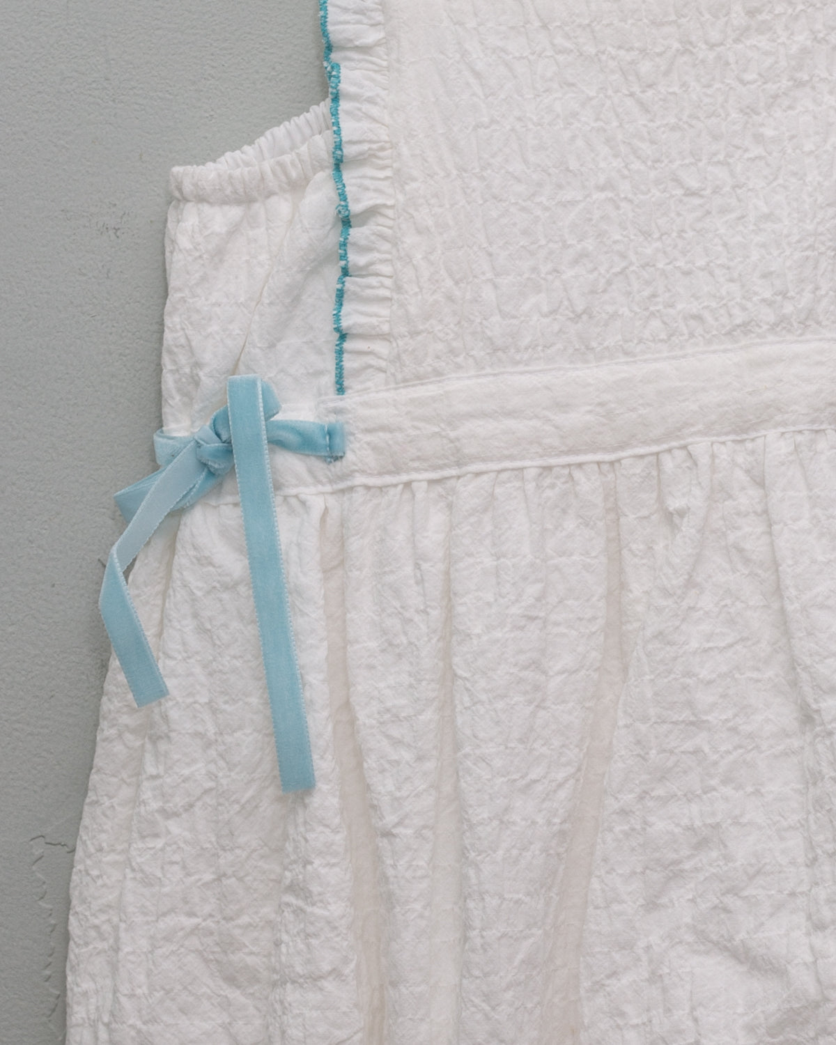 Ada Romper in White Baby Grows Cosmosophie