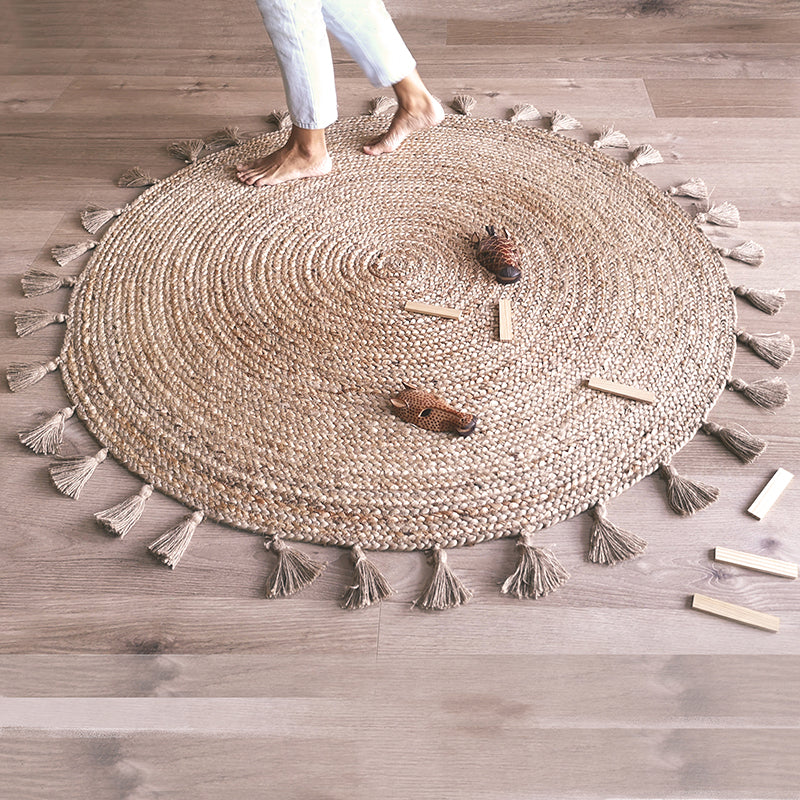 Else jute carpet with pompoms